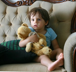 kid watching TV set-up-a-home-theatre-for-kids